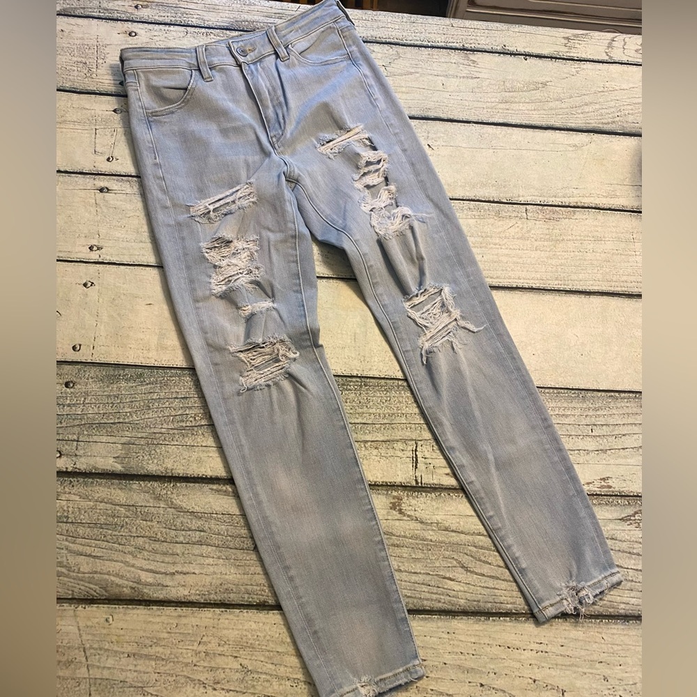 American Eagle light wash distress super hi rise jegging crop. 4